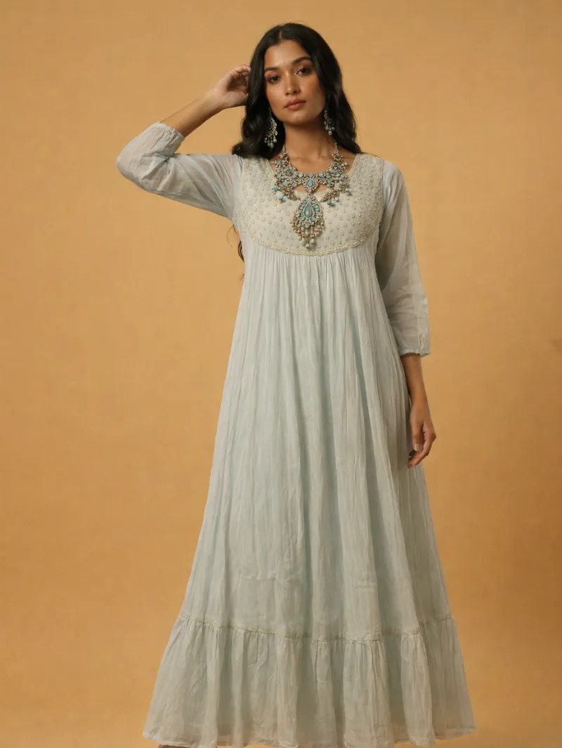 Light pista green gown with adjustable belt